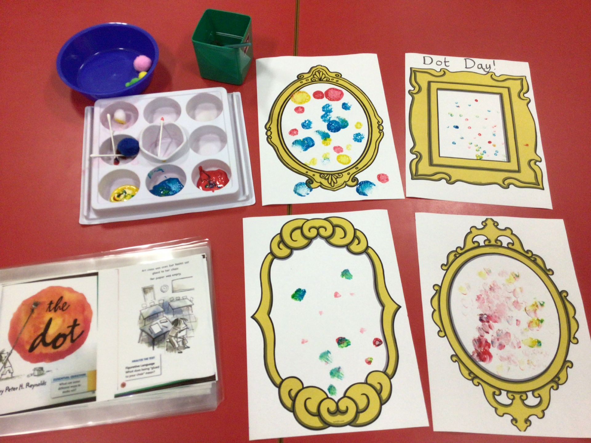 Today we experimented with making dots at Addenbrooke's using Pom poms, cotton buds and paint brushes. We also experimented with mixing different colours together. Our dot pictures are in gold frames just like Vashti's!